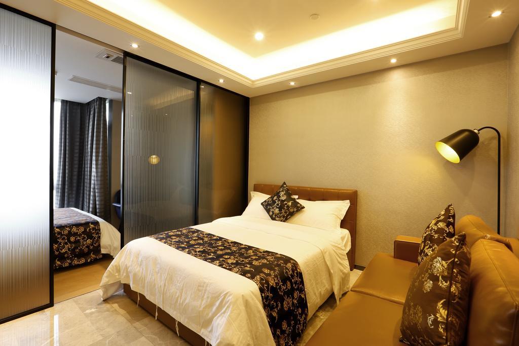Boman Holiday Apartment Bei Jing Lu Jie Deng Du Hui Branch Гуанчжоу Экстерьер фото