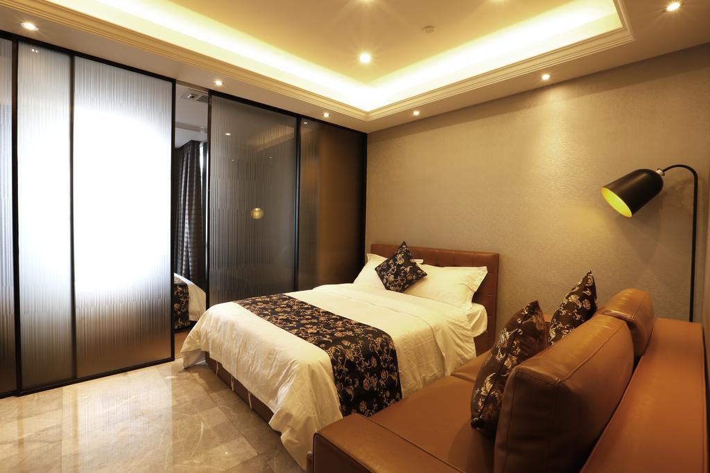 Boman Holiday Apartment Bei Jing Lu Jie Deng Du Hui Branch Гуанчжоу Экстерьер фото
